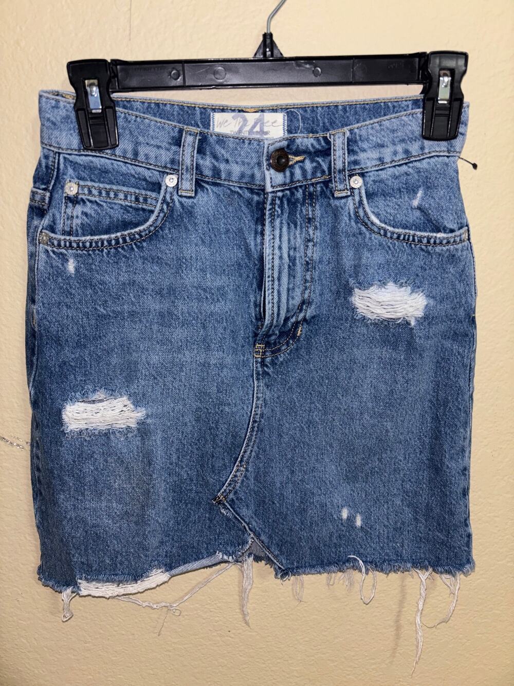 We The Free by Free People distressed denim mini skirt.